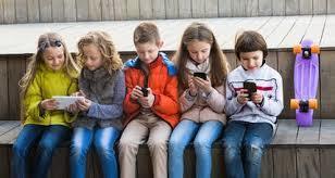 Students using their phones to get on the internet